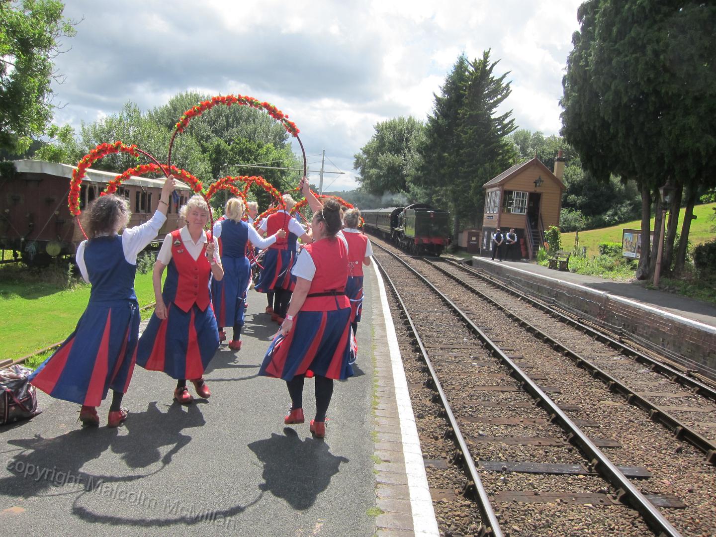 dancing on the platform at Hampton Loade as a train steams in from the opposite direction